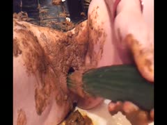 Huge cucumber got inserted to lady's ass to collect shit